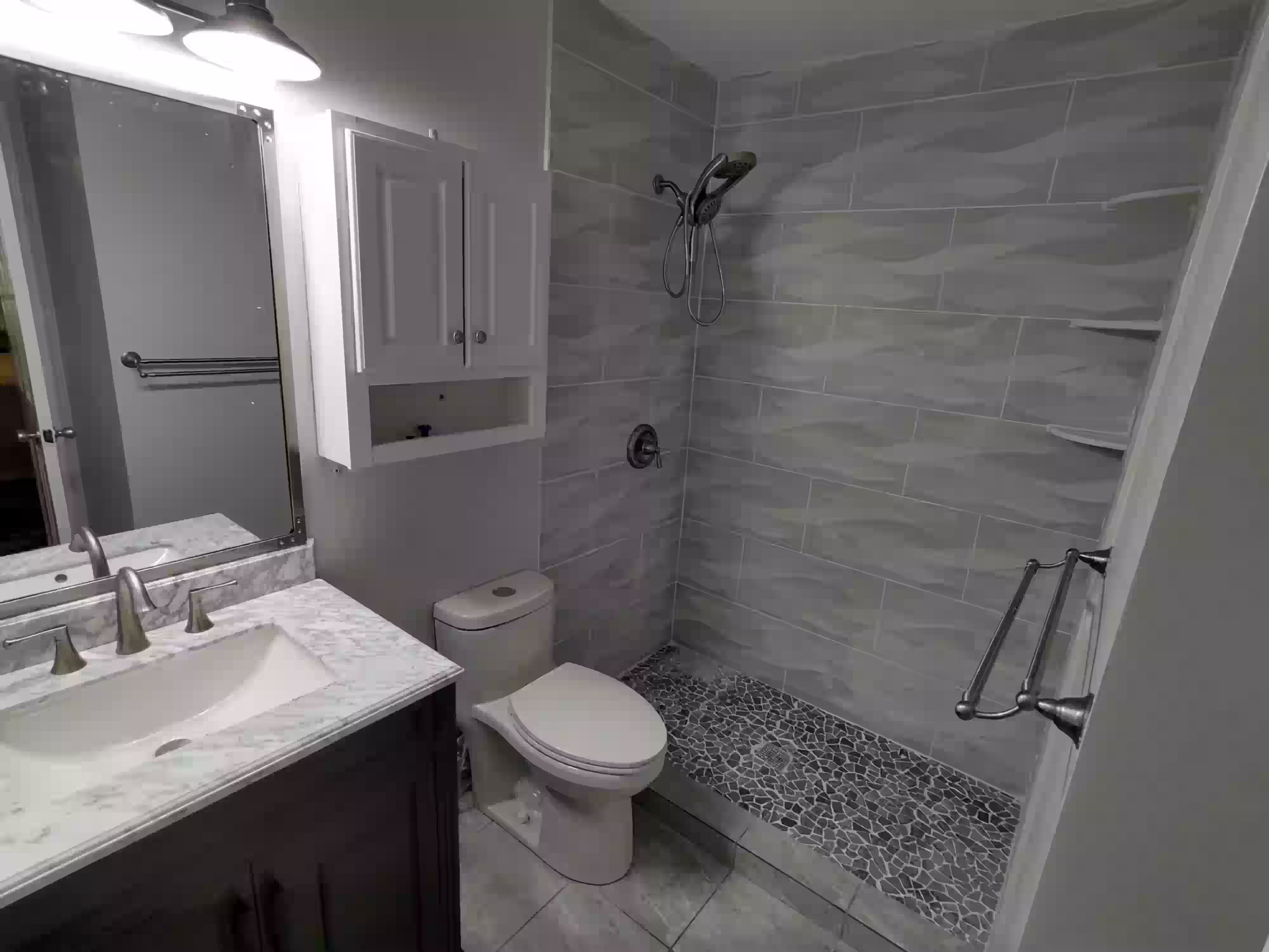 Bathroom after renovation by Handy Daniel Services